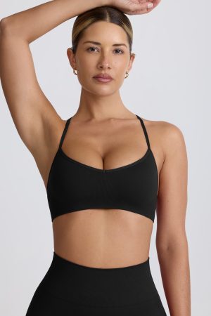 Super Sculpt Seamless Cross-Back Sports Bra in Black